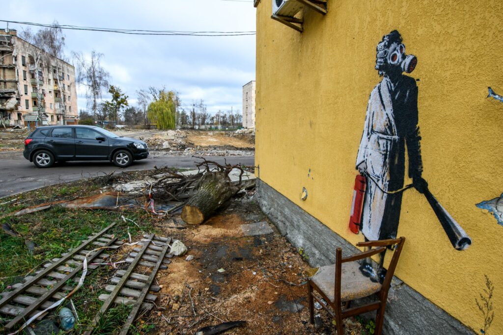 Pacifist Banksy with his art in Ukraine